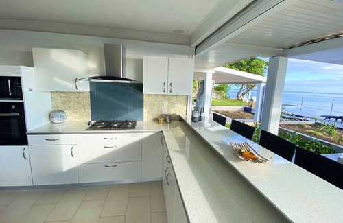 Punaauia Villa | Villa Vaiava: Exclusive Beachfront Infinity Pool Retreat