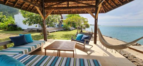 Papeto'ai House | Relax at Villa Vaihau: Family-Friendly Oceanfront Retreat