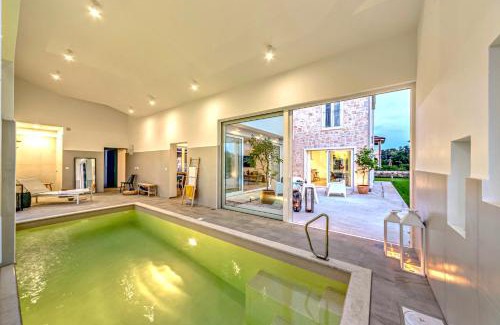 Muline Villa | Villa Vela Muline: Oceanfront Retreat with Heated Pool