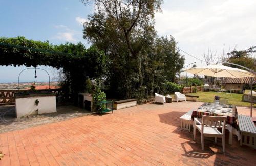 Viagrande House | VILLA VISCALORI A garden with pool and see view near Etna