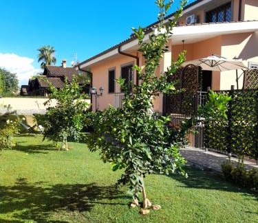 Zona XXX Castel Fusano Apartment | Villa Vittorio: Family and Pet-Friendly Retreat with High Ratings