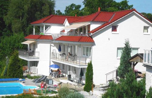 Sierksdorf Apartment | Villa Vogelsang: Poolside Retreat with Sauna & Ocean Views