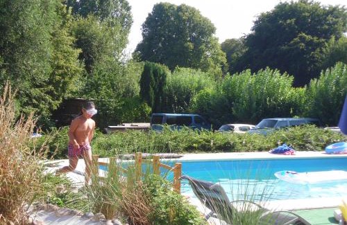 Sierksdorf Apartment | Villa Vogelsang: Poolside Retreat with Sauna & Ocean Views