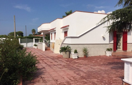 Maruggio House | Charming Villa Steps from the Sea with Garden Oasis