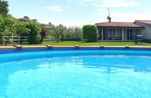 Manerba del Garda Villa | Idyllic Villa with Private Pool and Lush Garden Retreat