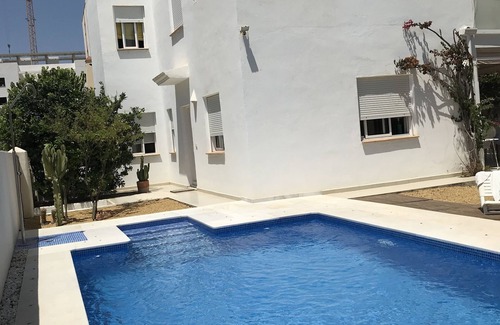 Puerto Rey Ski Chalet | Idyllic Villa with Pool and Ocean View - Rated 10/10