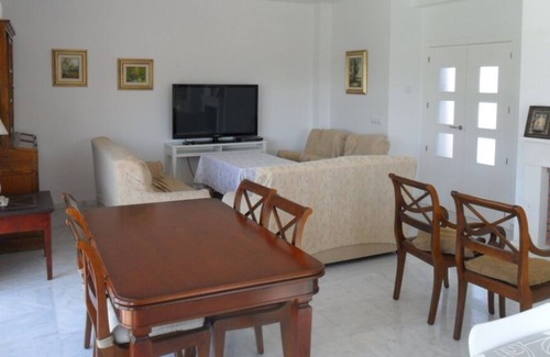 Nuevo Portil Ski Chalet | Spacious Villa with Pool for 16, Steps from the Sea