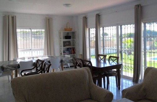 Nuevo Portil Ski Chalet | Spacious Villa with Pool for 16, Steps from the Sea