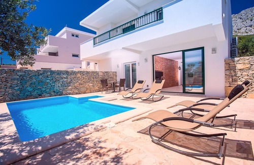 Omis Villa | Seaside Villa with Heated Pool, Steps from the Ocean