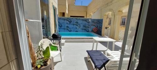 Munxar Villa | Inviting Villa with Pool and Ocean View in Munxar Gozo