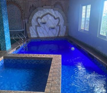 Cisarua Ski Chalet | Villa Zmurda: Oceanfront Retreat with Private Pool & Spa