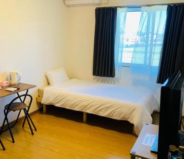 Omura House | Budget-Friendly Village BFH: Family-Friendly Retreat