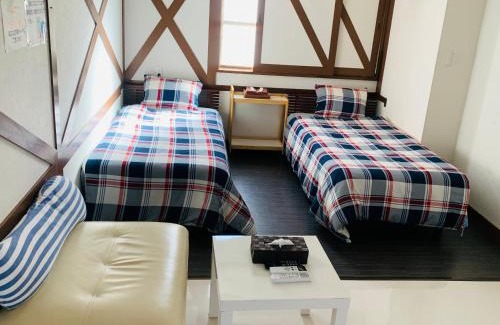 Omura House | Budget-Friendly Village BFH: Family-Friendly Retreat