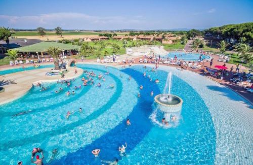 Marina di Montalto Apartment | Village with swimming-pool in Montalto Marina just 100 meters from the beach, mobile homes with air conditioning and private outdoor area