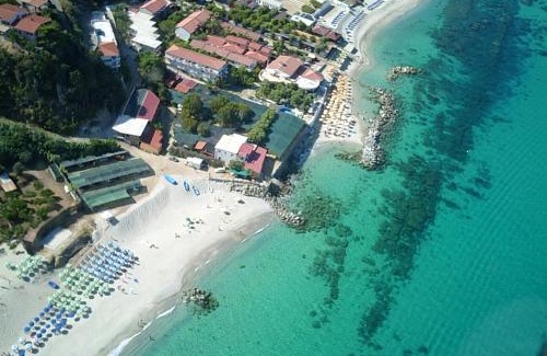 Ricadi Apartment | Discover Villaggio Camping Fiorina: Pet-Friendly Paradise