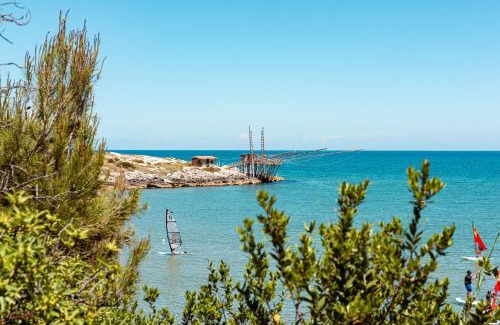 Defensola Resort | Beachfront Escape at Villaggio Camping Punta Lunga