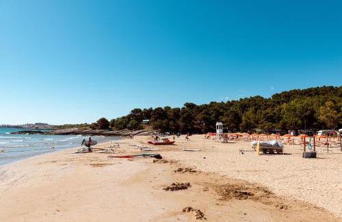 Defensola Resort | Beachfront Escape at Villaggio Camping Punta Lunga