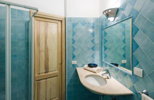 Baia Caddinas Apartment | Cozy Oceanfront Retreat at Villaggio Perlacea, Pet Friendly