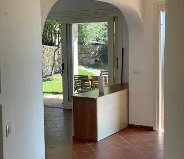 Capo Coda Cavallo Villa | Elegant Villetta con Giardino Punta Est with Ocean Views