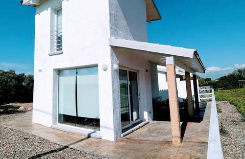 Sant'Anna Arresi Villa | Cozy Villetta Fanny Romantica: Ideal for Families & Pets