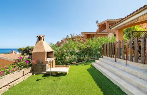 Villaputzu House | Family-Friendly Villetta Residence Porto Corallo: Rated 10/10