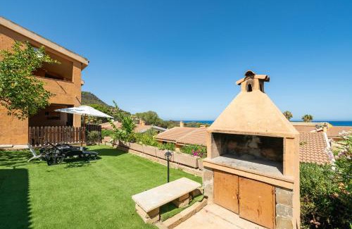 Villaputzu House | Family-Friendly Villetta Residence Porto Corallo: Rated 10/10