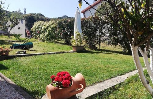 Sarroch House | Experience Villino Veronica: Family-Friendly Retreat with Top Reviews