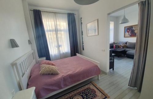 Business District Apartment | Elegant Vilnius Apartment with Stained Glass & Pet-Friendly