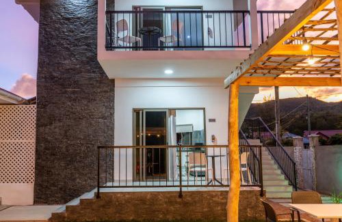 Au Cap Apartment | VincVilla: 4-Star Family-Friendly Retreat with Perfect Rating