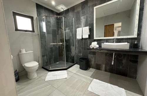 Au Cap Apartment | VincVilla: 4-Star Family-Friendly Retreat with Perfect Rating