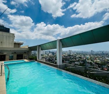 Phil-Am Apartment | Trendy Vinia Infinity Studio: WiFi, Netflix & Pool Access