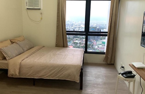 Phil-Am Apartment | Discover Vinia Residence: Family-Friendly & Accessible Stay