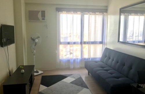 Phil-Am Apartment | Inviting Vinia Residences with Pool & Child-Friendly Amenities