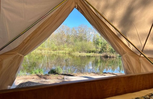 Pine City RV Rental | Unique Pondside Dome Tent with Spa Access & Family Friendly