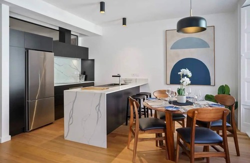 Hobart Central Business District Apartment | Discover Saddlers House: Vintage Suite with Café Vibes