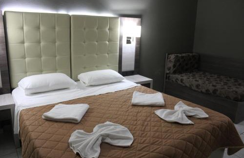 Polirizos Apartment | Oceanfront Virgin Mary: Guest Rated 9.4 with Family-Friendly Amenities