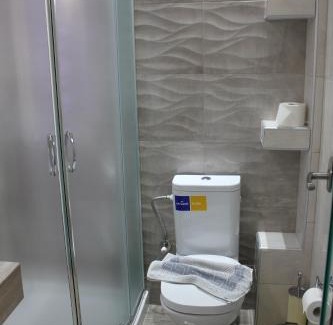 Polirizos Apartment | Oceanfront Virgin Mary: Guest Rated 9.4 with Family-Friendly Amenities
