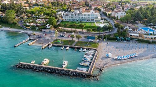 San Benedetto di Lugana Hotel | Oceanfront Vision Hotel: Guest Rated 9.1 with Pool & Hot Tub