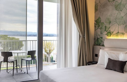 San Benedetto di Lugana Hotel | Vision Hotel: Oceanfront Bliss with Spa & Pool Access