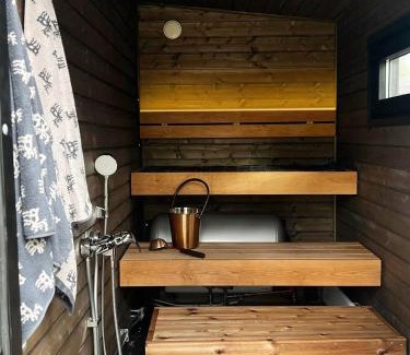 Muonio Ski Chalet | Visit Lapelland - Borealis Village with a Nature View, Fireplace, Sauna, Kitchen