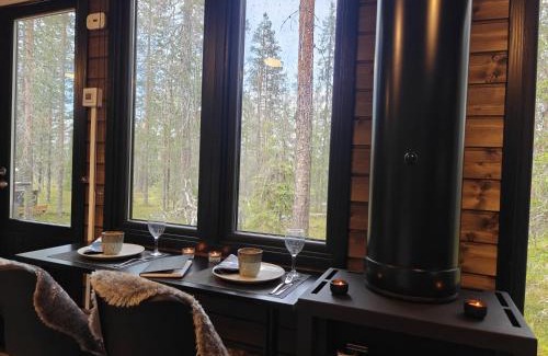 Muonio Ski Chalet | Visit Lapelland - Borealis Village with a Nature View, Fireplace, Sauna, Kitchen