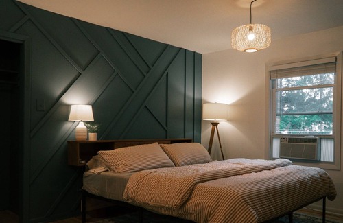 Grand Rapids House | Experience Mid-Century Modern Elegance with Family Amenities