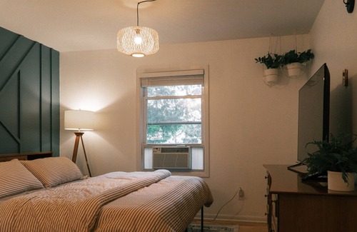 Grand Rapids House | Experience Mid-Century Modern Elegance with Family Amenities