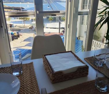 Fisterra Apartment | Scenic Vista al Puerto: Family-Friendly Getaway Awaits