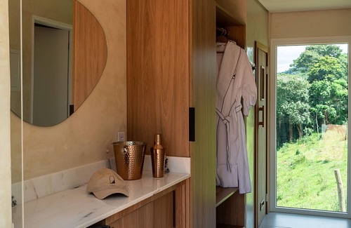 Campos do Jordao Cottage | Elegant Vista with 4 Suites, Heated Pool & Sauna Access