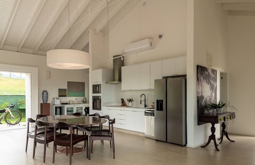 Campos do Jordao Cottage | Elegant Vista with 4 Suites, Heated Pool & Sauna Access