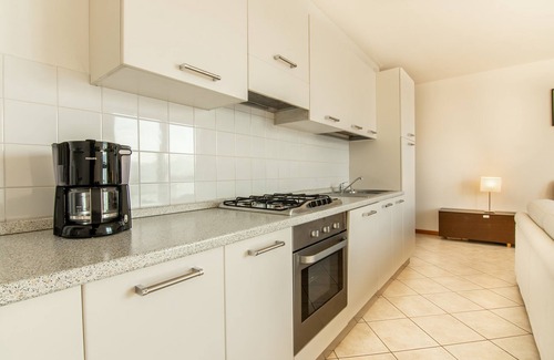 Perledo Apartment | Relaxing Vista d'Oro Ulivo Apt. 7 with Pool & Lake View