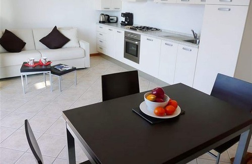 Perledo Apartment | Relaxing Vista d'Oro Ulivo Apt. 7 with Pool & Lake View
