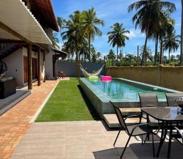 Porto de Pedras House | Discover VISTA DO PATACHO: Oceanfront Bliss by the Beach