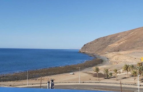 Gran Tarajal Apartment | Oceanfront Vista Mar 5: 4-Star Stay with Pool & Views